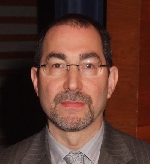 Head-on profile photograph of Dr. Andrew Moskowitz