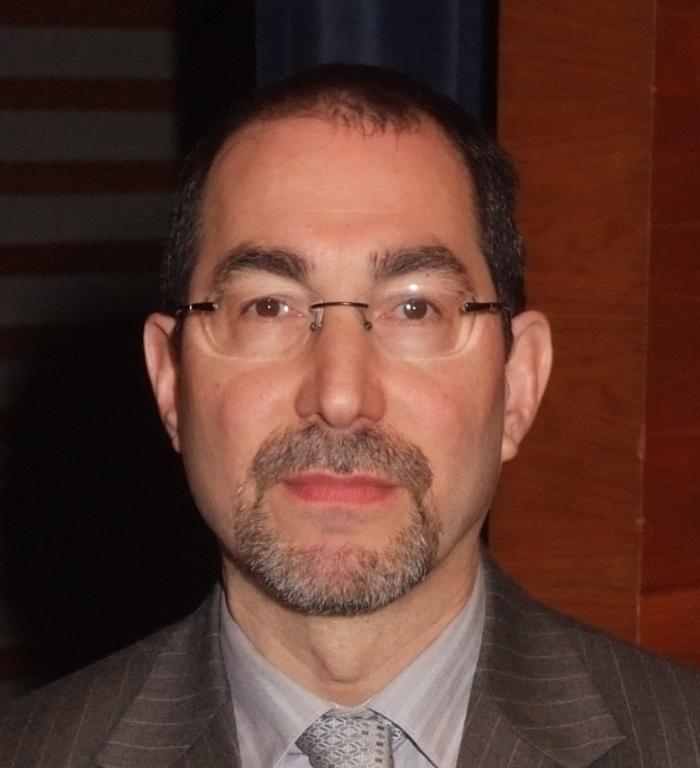 Head-on profile photograph of Dr. Andrew Moskowitz