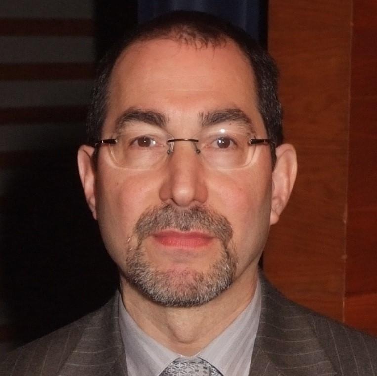 Head-on portrait photo of Dr. Andrew Moskowitz